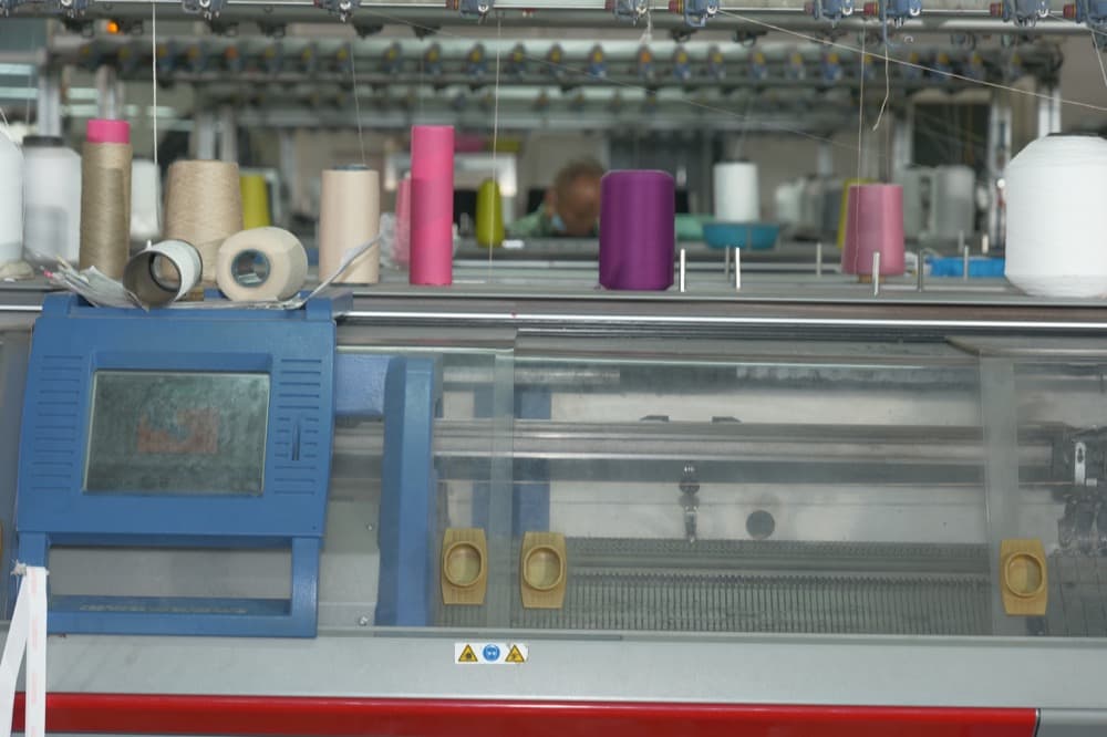 Yarn spools on machine